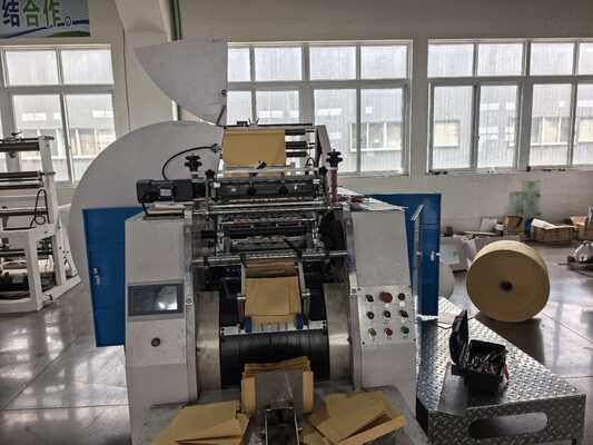 Macchina per sigillare e tagliare sacchetti di carta Kraft con larghezza da 420 a 600 mm e rotolo di stampa in ceramica a 400 maglie