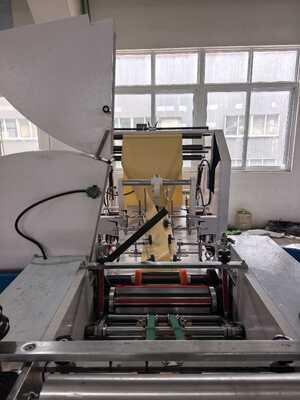 Macchina per sigillare e tagliare sacchetti di carta Kraft con larghezza da 420 a 600 mm e rotolo di stampa in ceramica a 400 maglie